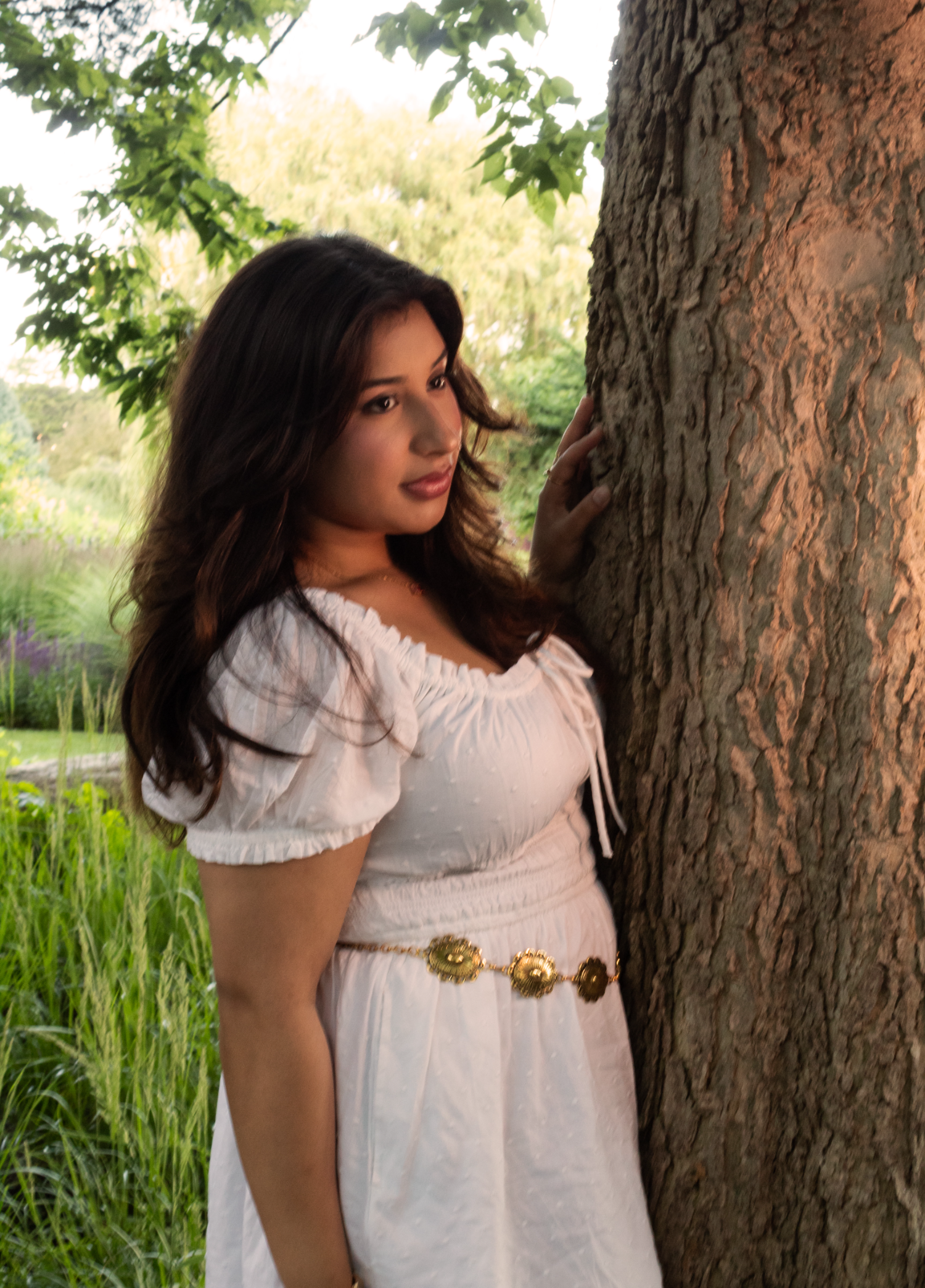 Manvi Thakur in a white dress at golden hour
